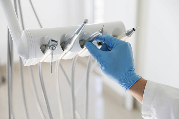 Professional Tooth Extraction technician working in Old Saybrook Center, CT
